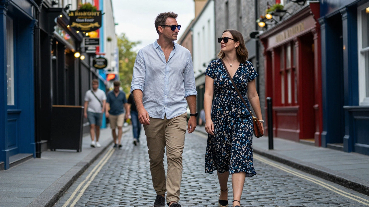 Couple in smart casual summer outfits walking